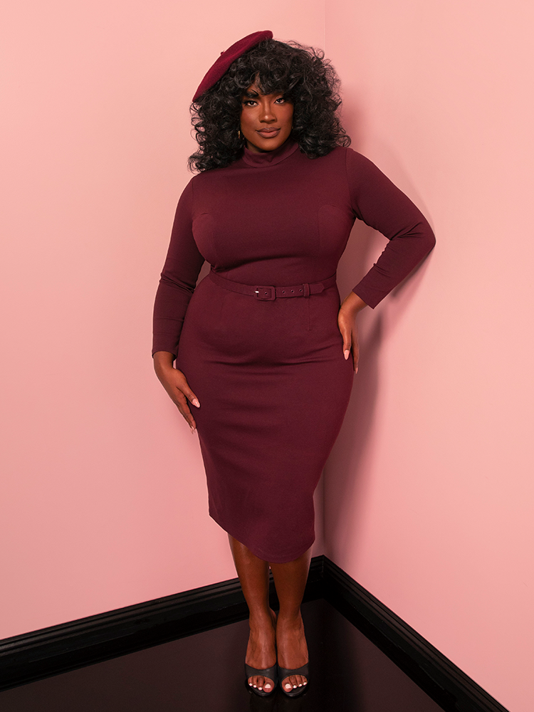 Step into classic Hollywood seduction with the Bad Girl Wiggle Dress in merlot. This vintage-inspired piece is a must-have for fans of figure-flattering silhouettes and bold, timeless hues.