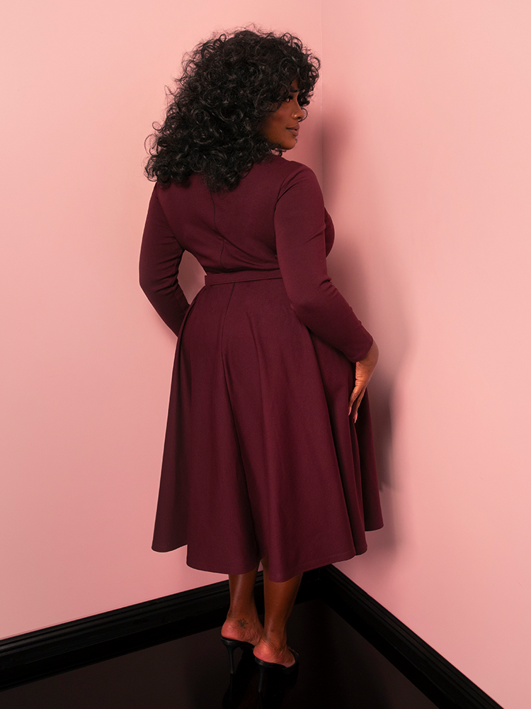 Elevate your wardrobe with the Bad Girl Swing Dress in merlot, a vintage style dress designed for graceful twirls and striking entrances. Its deep red hue adds a dramatic touch to your evening looks.