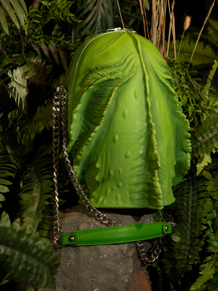 Capture the essence of retro horror with this Creature from the Black Lagoon Monster Bag, a unique addition to any collection.