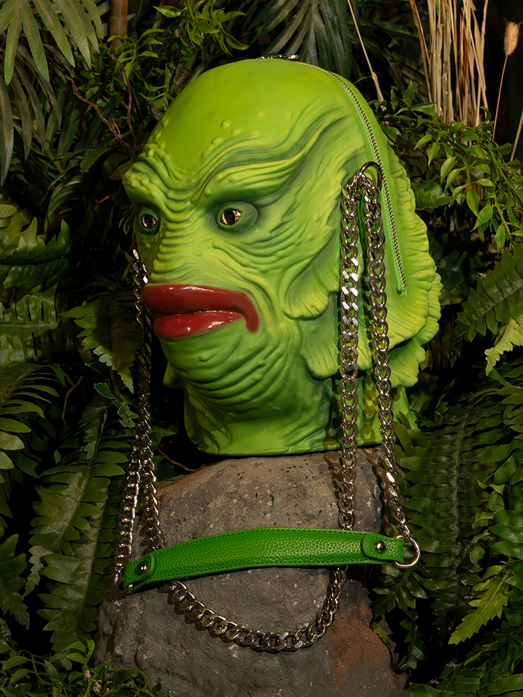 Show off your love for vintage horror with this stylish Creature from the Black Lagoon Monster Bag, designed for fans of the iconic Universal Monsters.