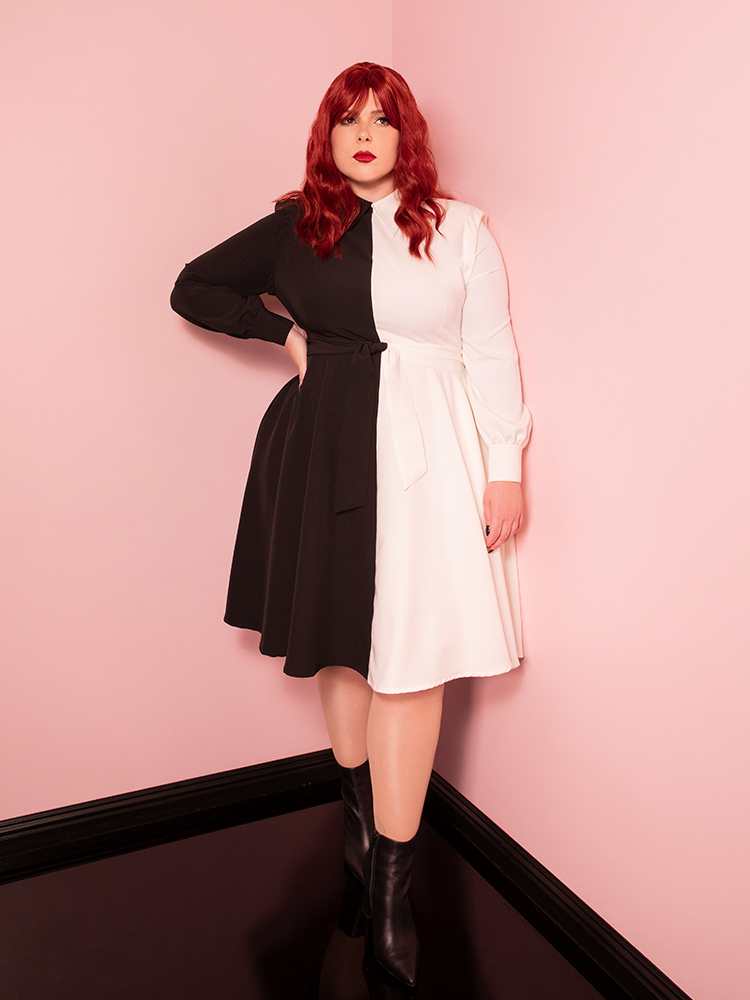 This black-and-white striped Delia Deetz Shirtdress captures the essence of retro Hollywood glamour, with a fun Beetlejuice twist.