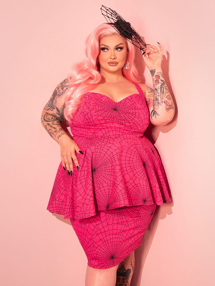 Turn up the charm with the Glamour Girl Pink Dress, a retro-inspired piece that brings out your inner Hollywood starlet.