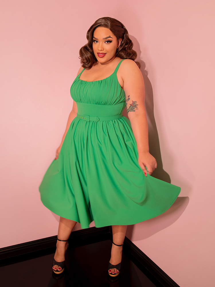 Infuse your wardrobe with timeless elegance with our clover green Ingenue dress, a chic and sophisticated piece.