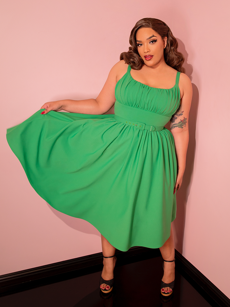 Step out in style with our clover green Ingenue dress, a perfect blend of vintage charm and modern elegance.