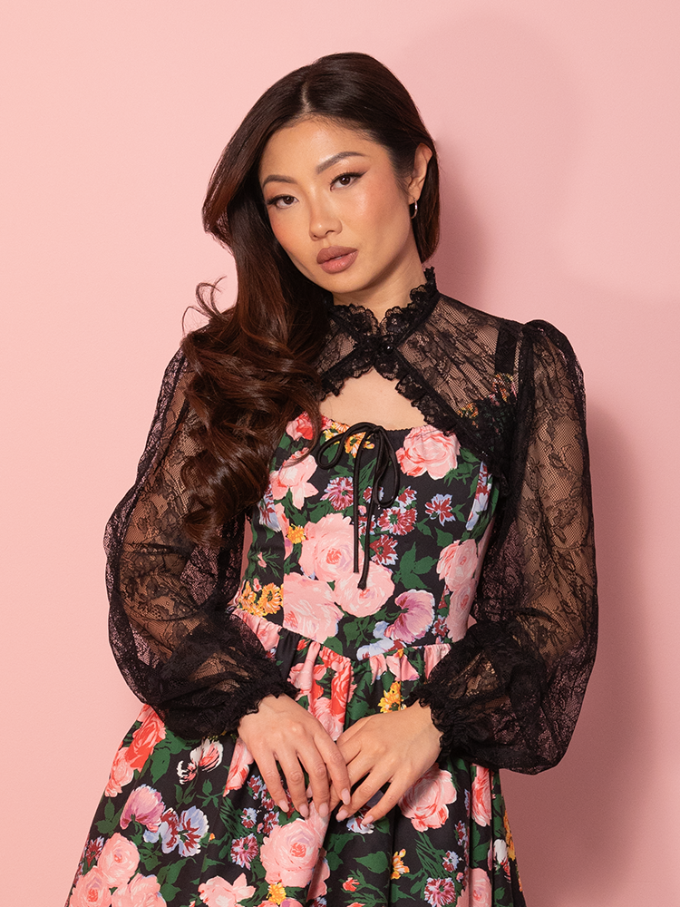 Channel old Hollywood charm with this black lace bolero, a vintage-inspired staple that pairs effortlessly with dresses for an extra hint of elegance.
