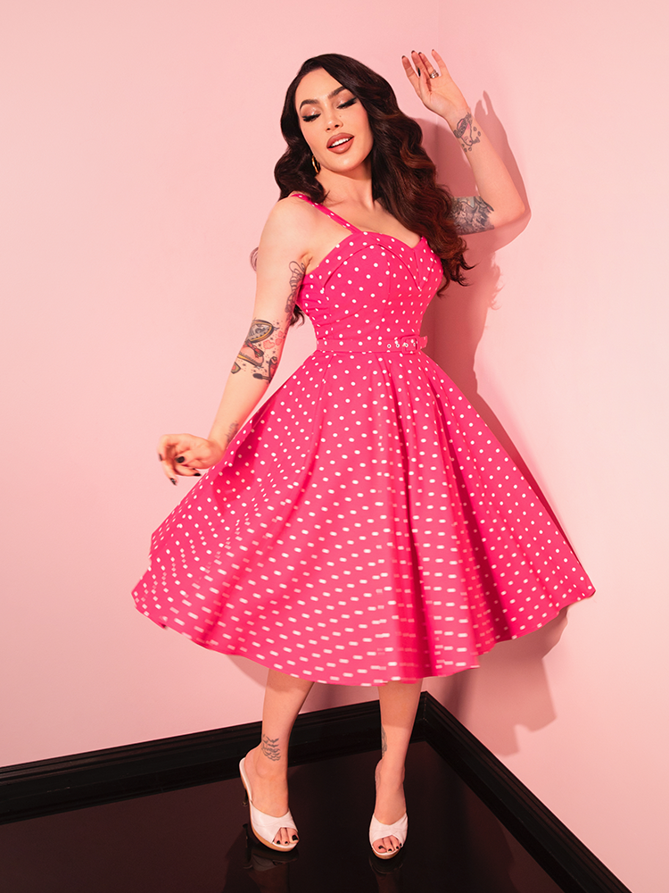 Bring a little classic Hollywood to your look with the Maneater Pink Polka Dot Swing Dress, ideal for creating a timeless, elegant silhouette.