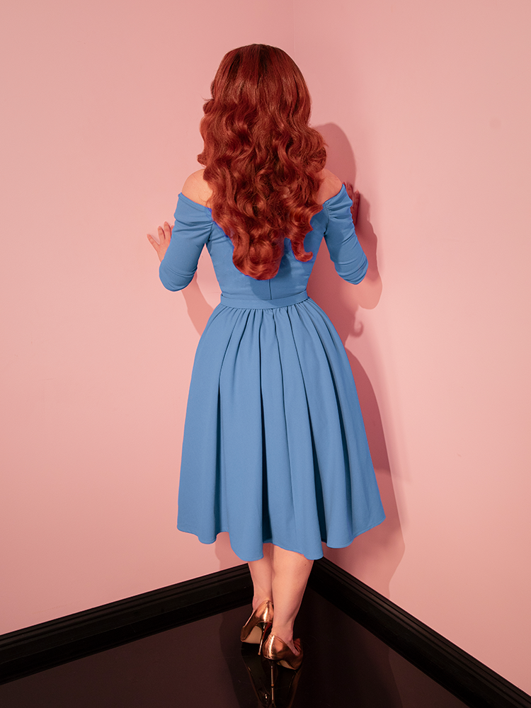 With its elegant design and timeless appeal, the Starlet Swing Dress in Sky Blue is a must-have for vintage fashion lovers. Featuring a flattering bodice and a twirl-worthy skirt, this dress is a stunning nod to classic Hollywood style.