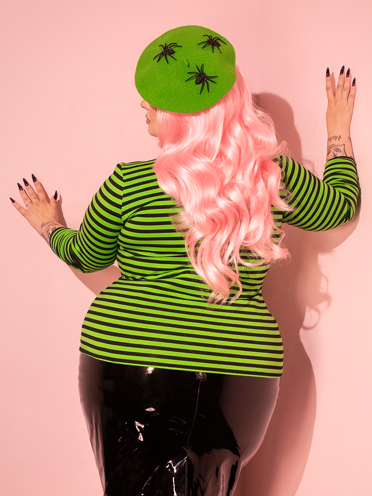 The Troublemaker Top in Slime is all about playful elegance, offering a retro-inspired look that’s perfect for turning heads.