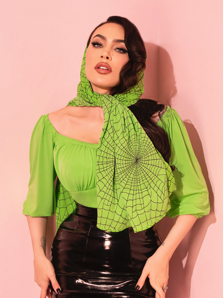 The Vacation Top in Slime brings a playful retro twist to your look, perfect for sunny days and vintage-inspired outfits.