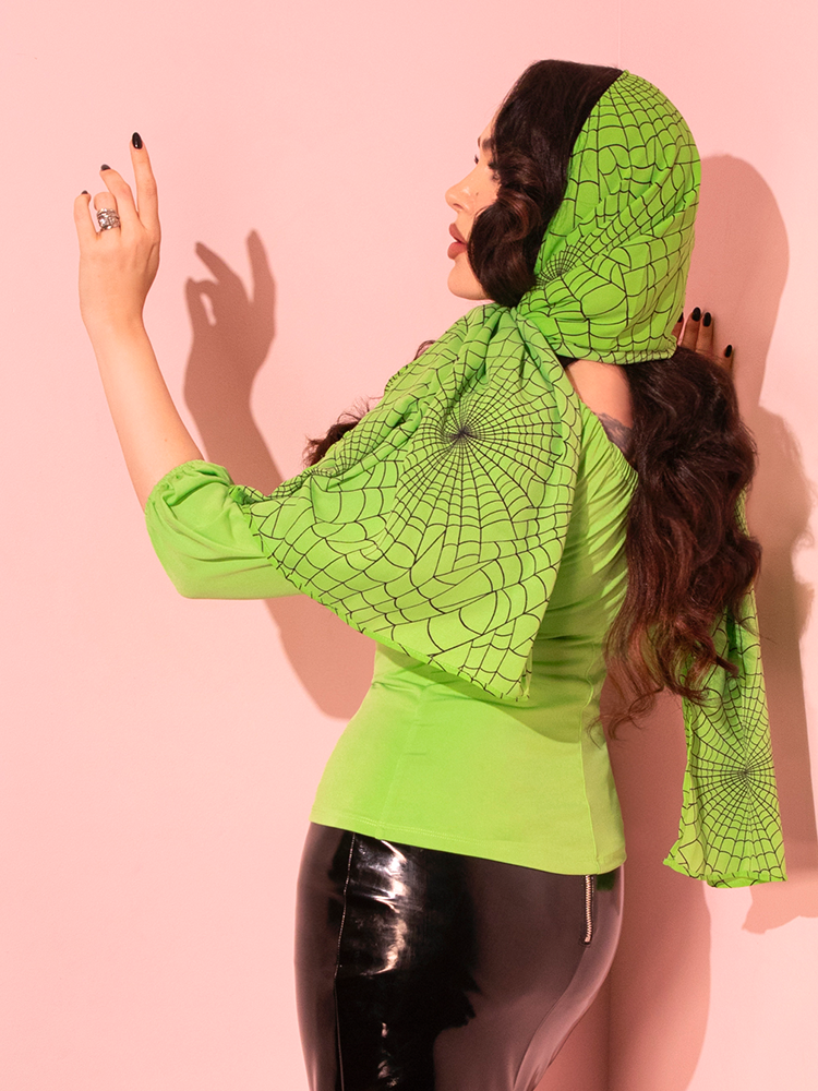 The Vacation Top in Slime is your ticket to a retro-inspired outfit, featuring a bold hue that’s perfect for a day in the sun.