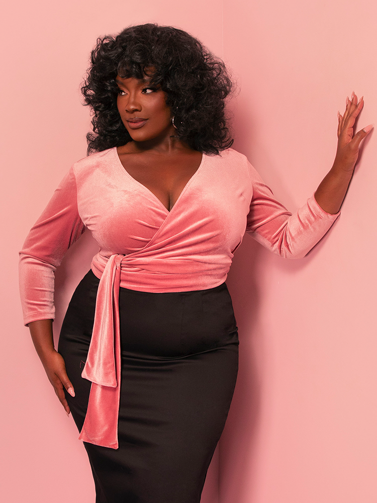 This Vixen Pink Velvet Wrap Top combines old-school glamour with modern versatility. Its rich velvet texture and flattering wrap design make it an iconic choice for day-to-night looks.