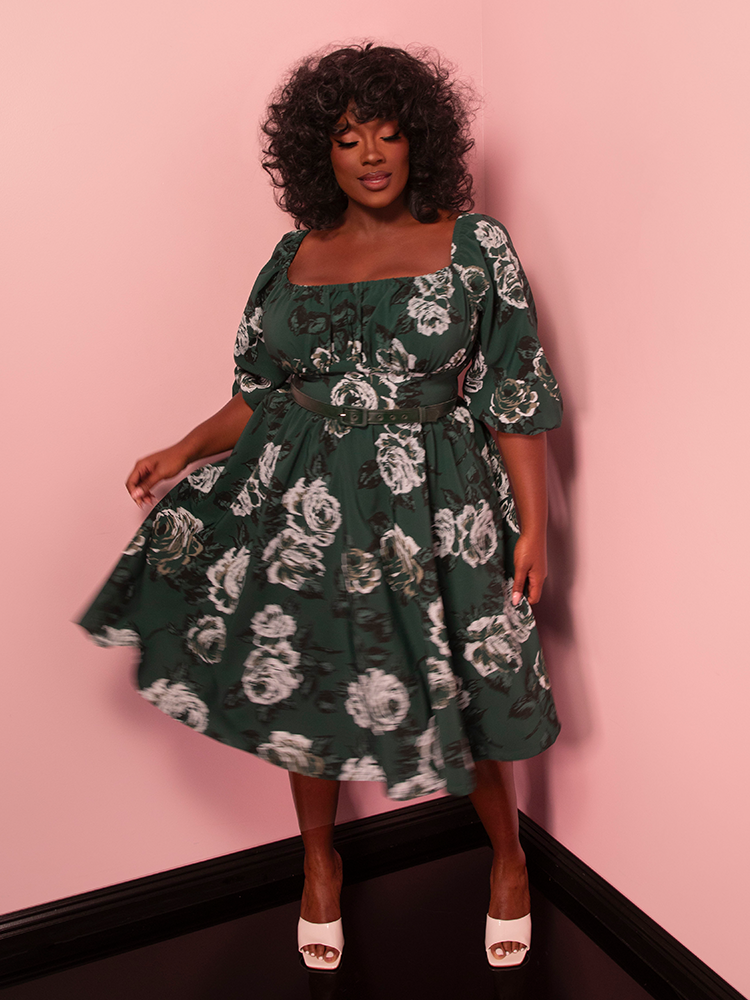 Effortlessly chic, this vintage green rose vacation dress brings a touch of romance to your getaway wardrobe. A true classic for creating memorable vacation looks.