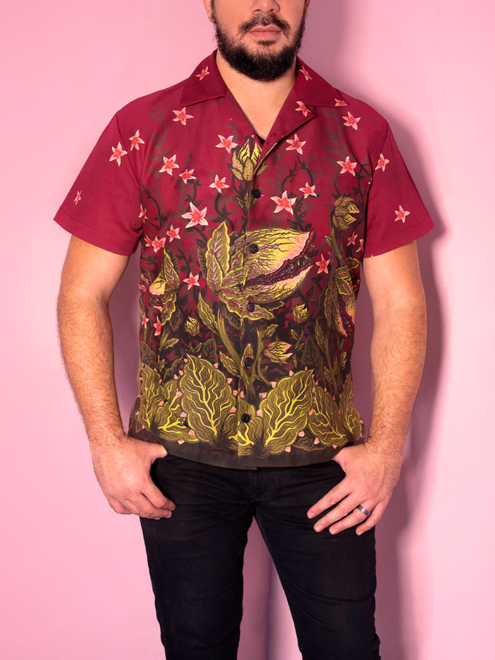 Male model wearing the Maneating Monster Print on a button-up retro shirt.